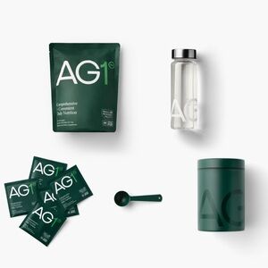 AG1 green powder, canister, travel packs